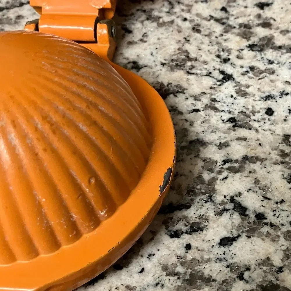 Well-Loved Hand Held Orange Squeezer